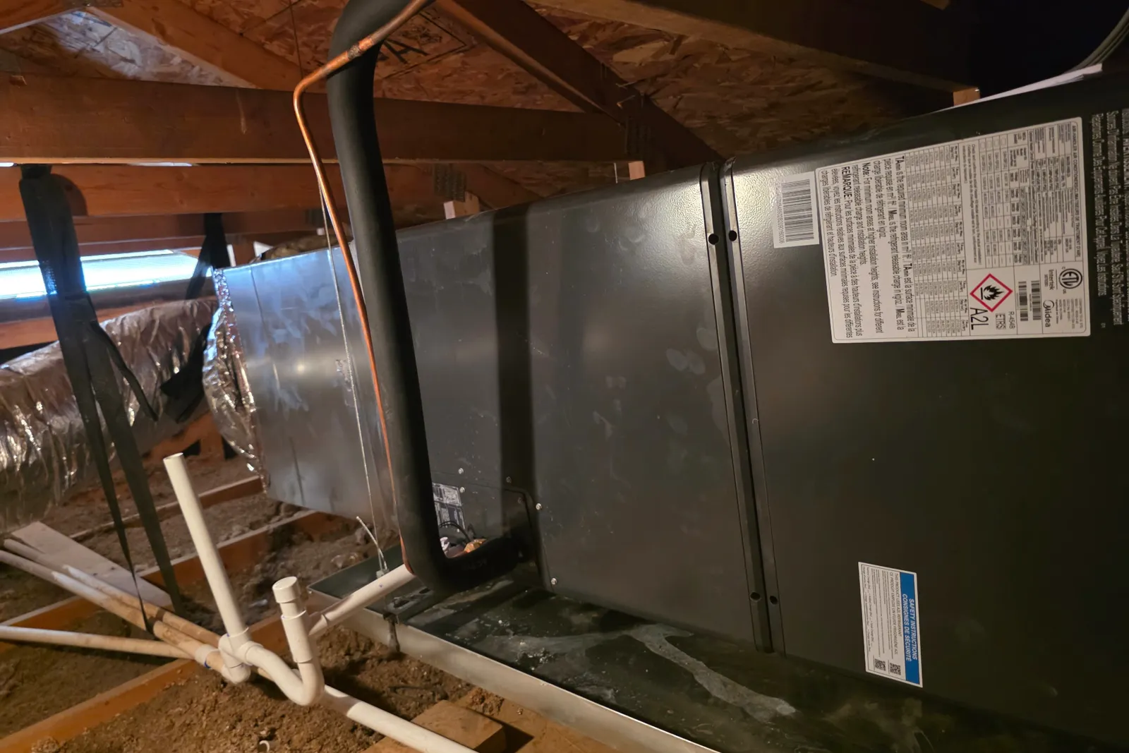Attic air handler and heating unit serviced by Chandler Air Mechanical