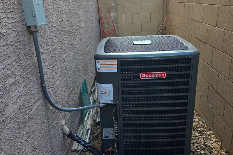 Goodman AC condenser in a side yard